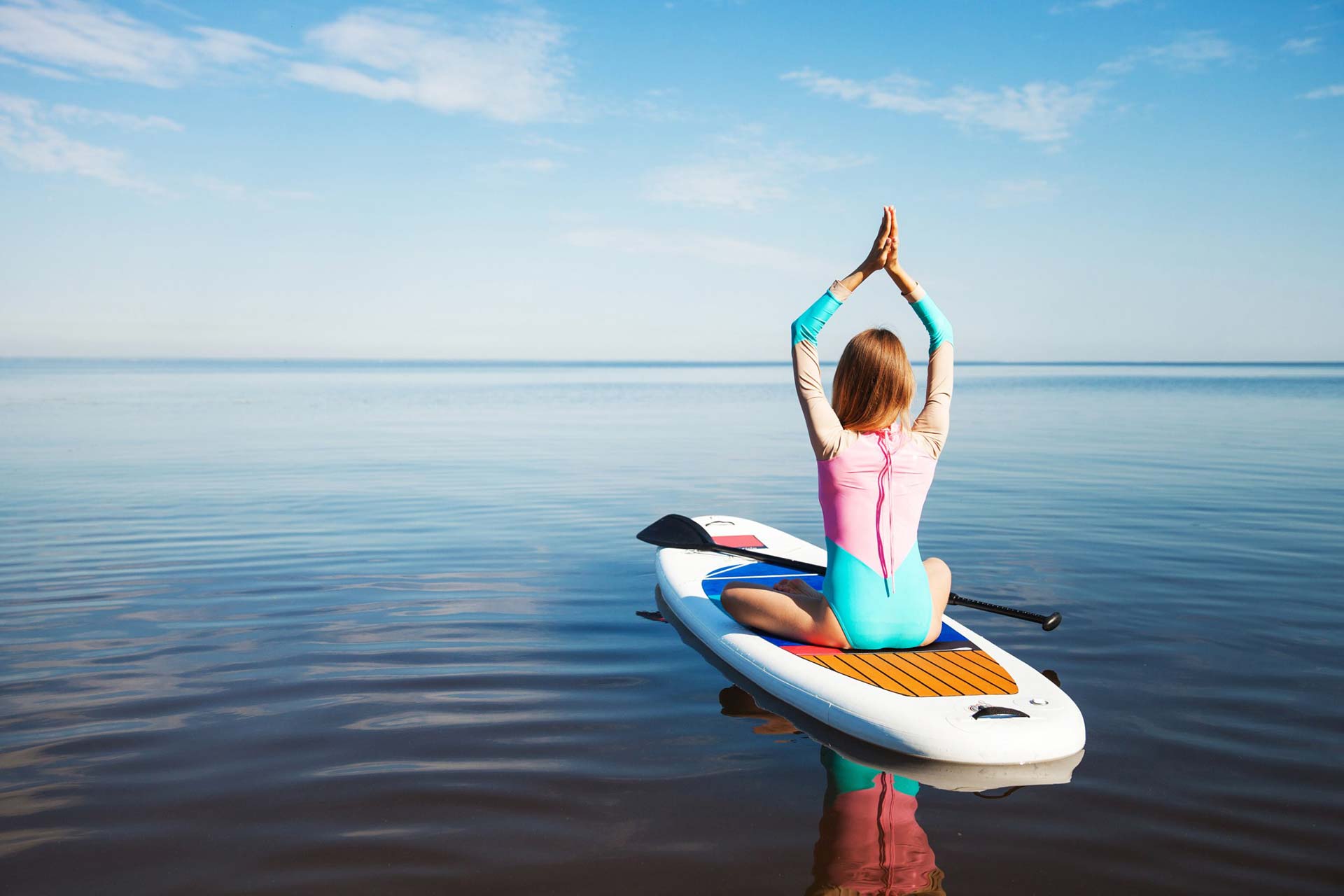 Al momento stai visualizzando Paddle yoga: tutto ciò che devi sapere per iniziare